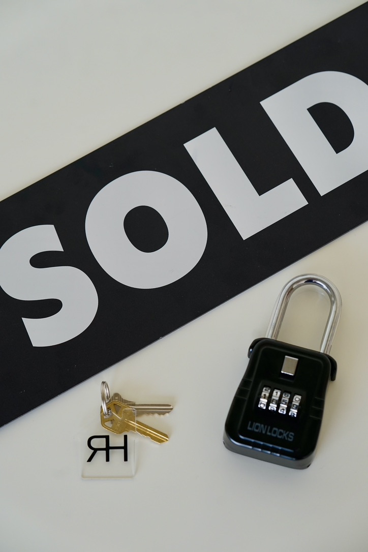 Successful home closing with keys being handed over